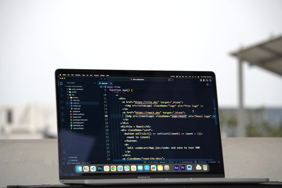A detailed, close-up digital image of a computer screen displaying lines of code in HTML, with syntax highlighting in various colors including green, red, and white on a black background. The code app